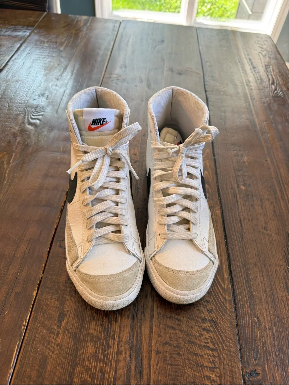Nike Blazer White High-Top Sneakers with Black Swoosh and Cream Accents